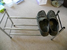 shoe rack made from chromed metal tube