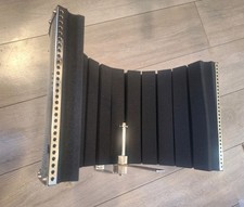 Microphone isolation shield - ,