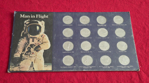 Man flight shell coin - man,