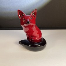 Royal Doulton Flambé seated