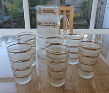 Vintage - Water Jug and Six Glasses with Gold and Etched Glass bands.