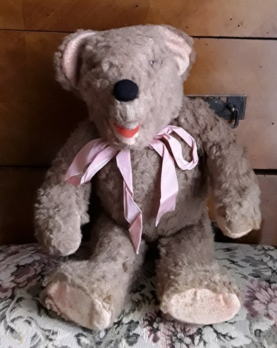 Vintage squeaky teddy bear