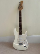 Strat-style guitar– Olympic