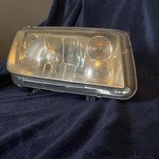 Volkswagen Bora Headlight Standard Oe Used  drivers side / right front.