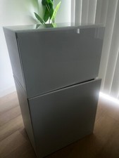 White besta ikea unit with high gloss doors