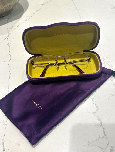 Gucci gg0571o rimless gold - gucci,