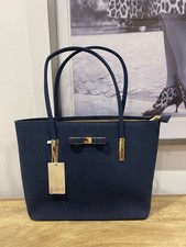 House of Milano Bow Shoulders