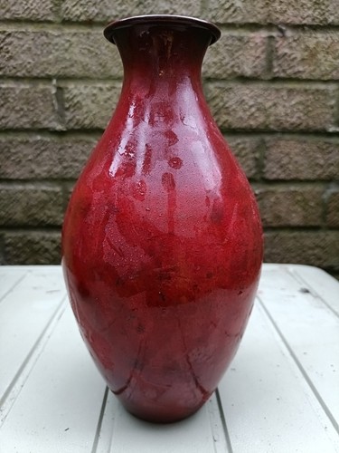 Ceramic vase with - , oxblood
