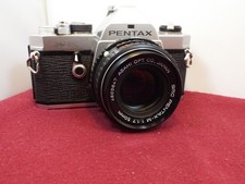 Pentax MX  chrome body with 50mm 1.7  super condition.