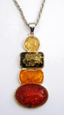 B839) Faux Amber resin oblong pendant necklace with silver tone chain