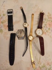 4 Wrist Watches. Ingersoll Shockproof.  2 Seconda. 1 Lotus And 1 Swatch Strap.