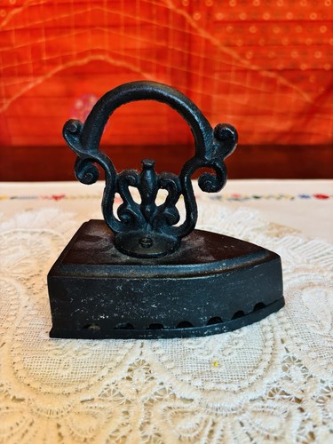 Antique cast iron sad - antique,