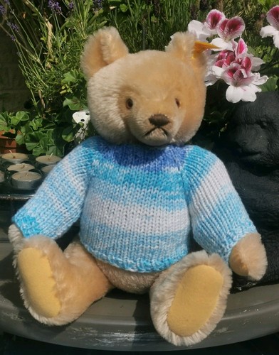 Hand knitted teddy bear