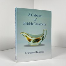 A Cabinet Of British Creamers