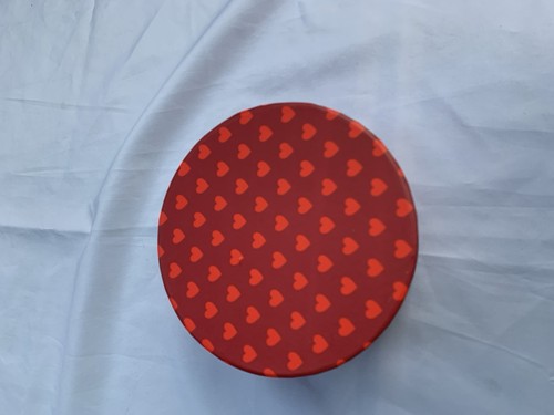 Two small hat boxes with - hat, lids