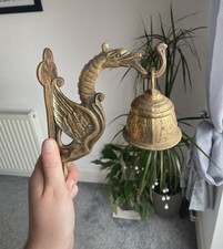 Vintage Peerage Brass Wall Mounted Hanging Bell Dragon Holder. Clapper missing. 
