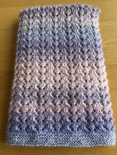 Hand knitted multi - hand,