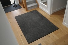 Dark grey IKEA "STOENSE" rug