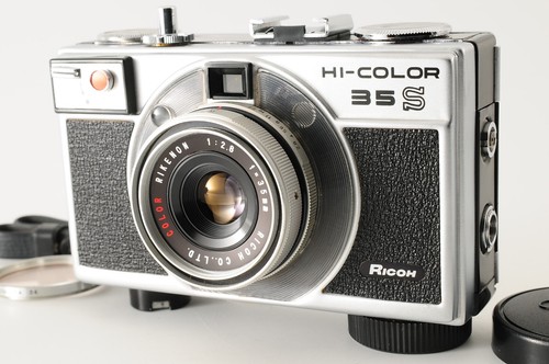 Near mint strap - w/strap, lens