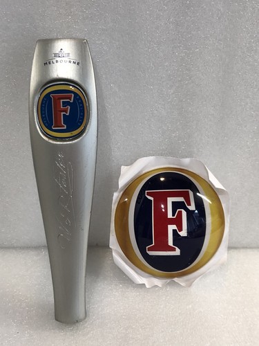 Fosters beer tap handle and - beer,
