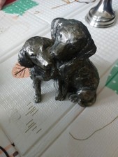 bronze-effect sculpture of two