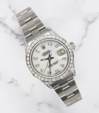 Rolex Datejust Ladies 26mm with White MOP Diamond Dial, Bezel & Shoulders.