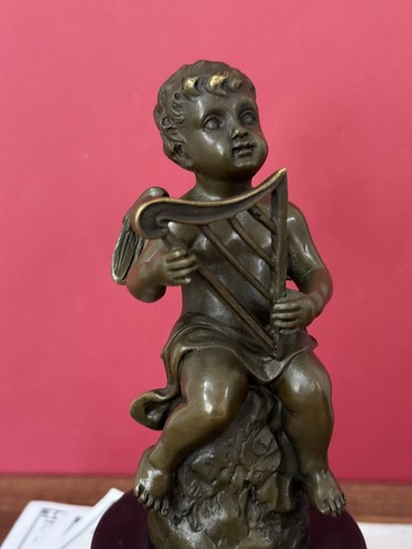 Bronze statue cherub playing - cherub,