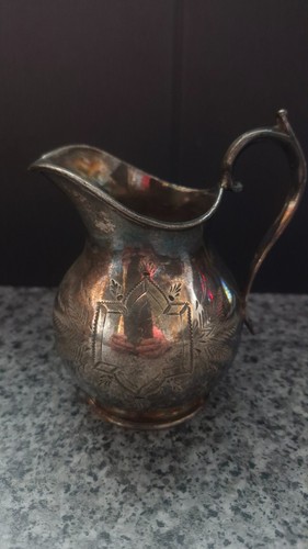 Silver plated small metal jug