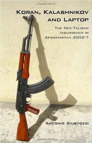 Koran kalashnikov and laptop - koran,,