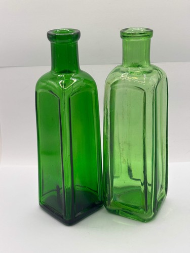 Old green glass izal bottles - glass,