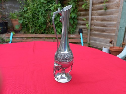 Pewter vase with elephant