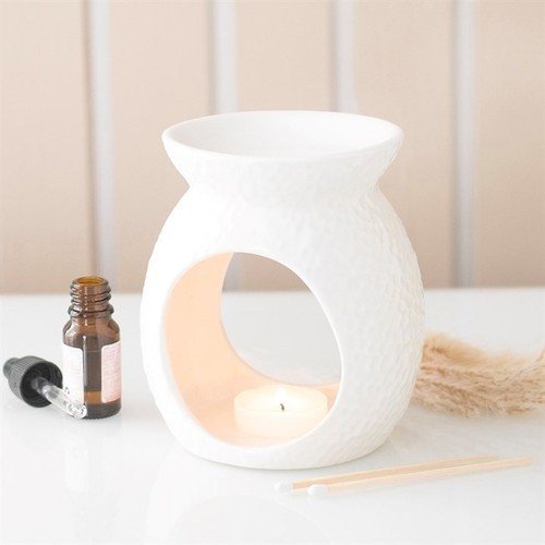 Dimpled oil burner - and, wax