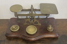 Antique British Set Of Brass Postal Scales With Weights On A Wooden Base.