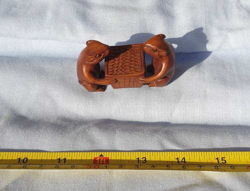 Netsuke two mice - carrying, a