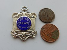 A SILVER & ENAMEL MEDAL/FOB, OPERATIVES' EXHIBITION, 1949. CLASS 30, G.A. MILLER