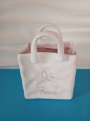 Small handbag vase - with, face