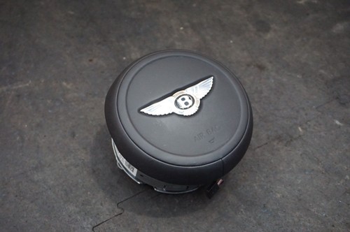 Front driver steering wheel - front,