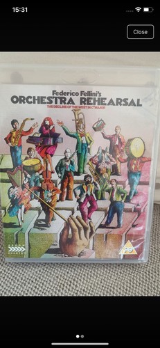 Orchestra rehearsal arrow - -,