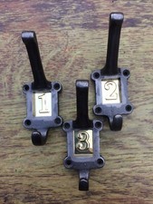 3 X CAST IRON SCHOOL COAT