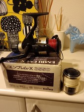 Daiwa spinning reel emblem - reel,