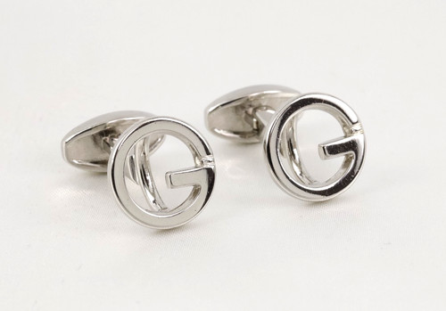 Gucci silver tone round - gucci,