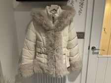 Ladies Cream Coat. Faux Fur