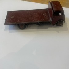 DINKY TOYS 512 GUY FLAT TRUCK  CAB MAROON , BLACK CHASSIS & MAROON HUBS