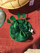 Dark green small sized fascinator