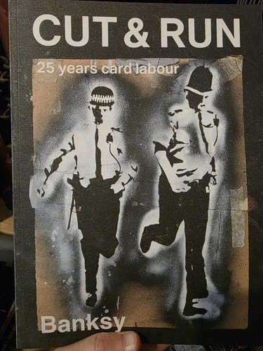 Banksy cut and - cut,