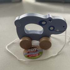 Pull along animal wooden hippo - pull-along,