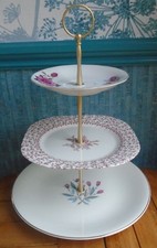 3 tier china XL cake stand Mismatched white and pink plates with roses