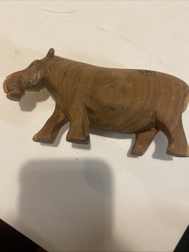Wooden hand calved hippo - calved,