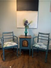 Solid mahogany occasional chairs and drinks cabinet sage green palm leaf print 