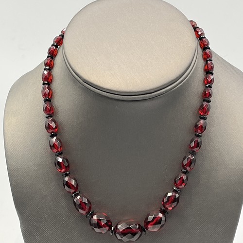 Cherry amber bakelite - amber, faceted